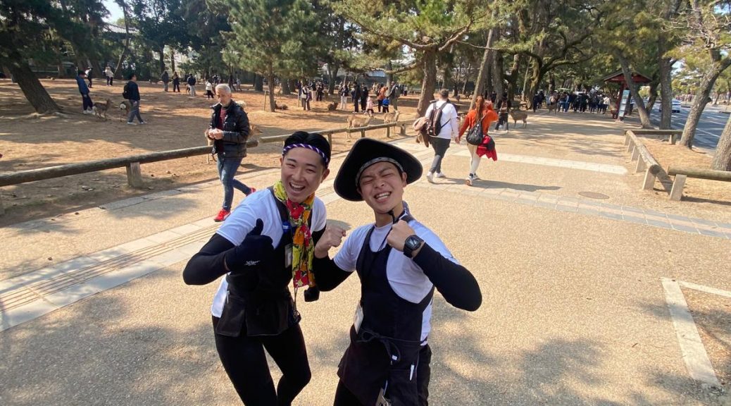 Traditional rickshaw ride in Nara, Japan, with a scenic backdrop of lush greenery and historic streets. A unique way to explore the city's cultural charm and serene atmosphere, often accompanied by friendly guides sharing local stories.